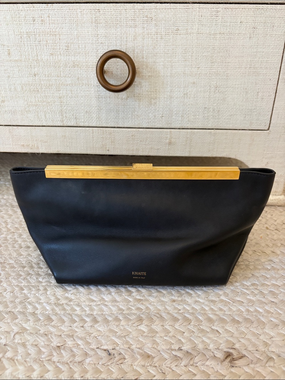 Khaite Aimee black leather envelope clutch